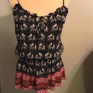 Blouse straps triviales and elephants.